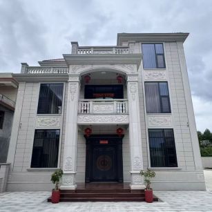 毕节 芝麻白石材别墅干挂案例展示