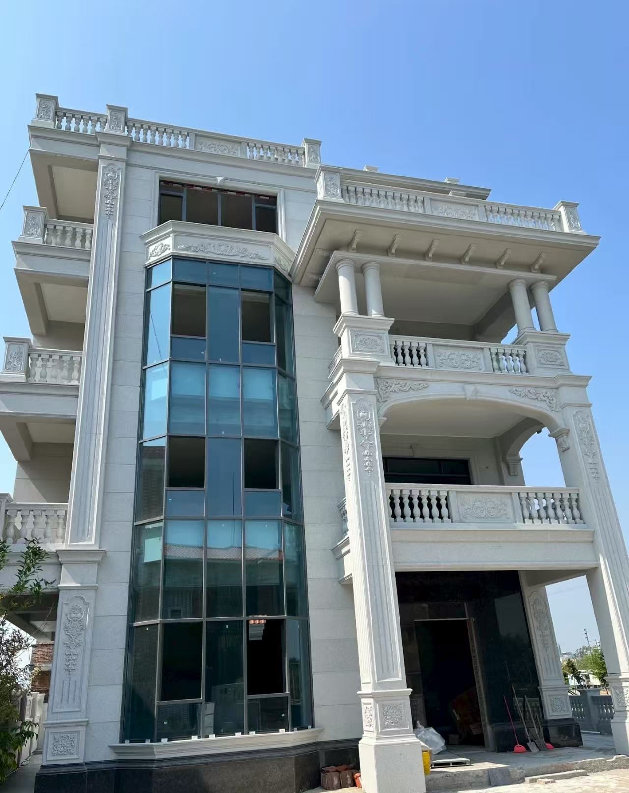 毕节 芝麻白花岗岩别墅外墙干挂效果展示